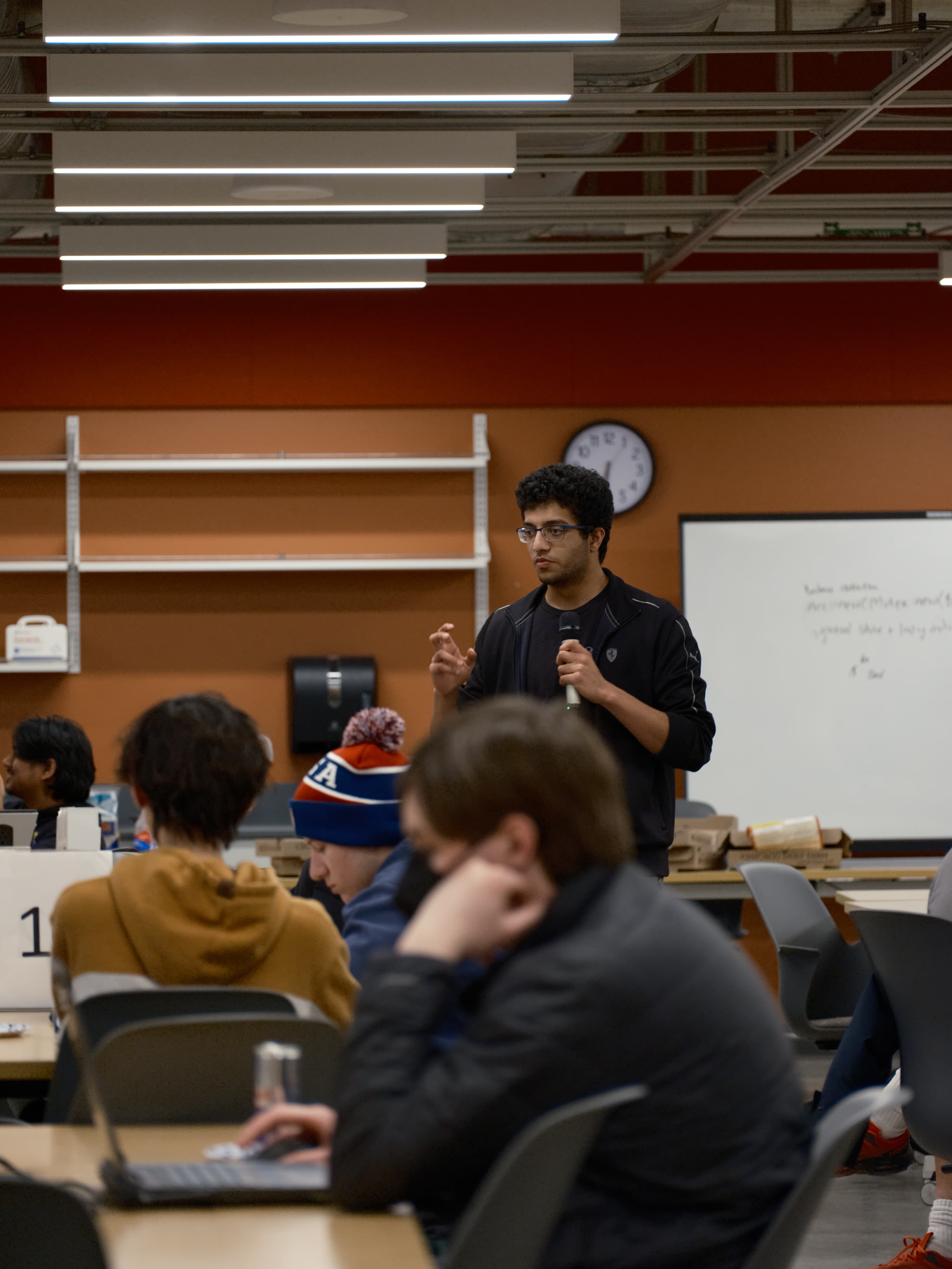 Malhar Khisty presenting an AI Club workshop to students